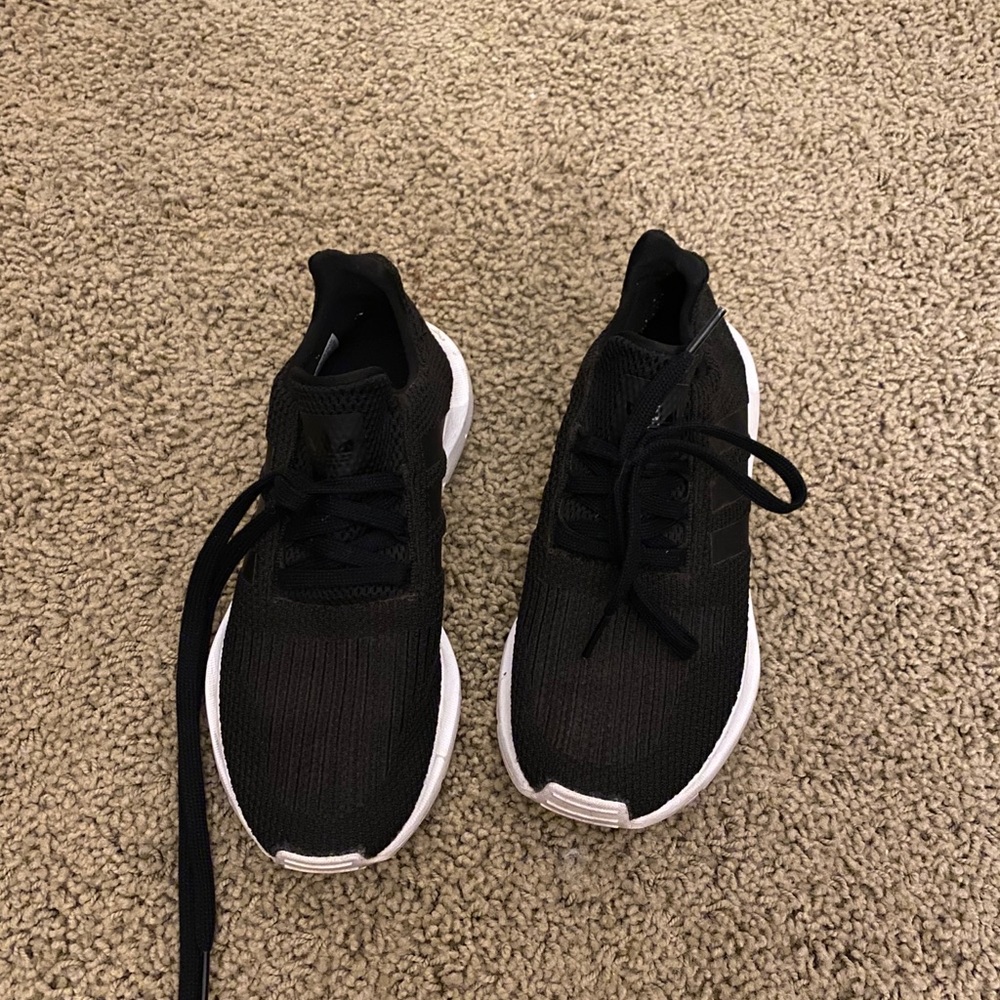 Black Adidas running shoes